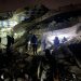 Syrian rescuers (White Helmets) and civilians search for victims and survivors amid the rubble of a collapsed building following an earthquake, in the rebel-held northern countryside of Syria's Idlib province on the border with Turkey, early on February 6, 2023, - At least 50 have been reportedly killed in north Syria after a 7.8-magnitude earthquake that originated in Turkey and was felt across neighbouring countries. (Photo by Aaref WATAD / AFP) (Photo by AAREF WATAD/AFP via Getty Images)

Rescue workers search the rubble of a collapsed building in Idlib, Syria, on February 6. (Aaron Watad/AFP/Getty Images)