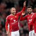 MANCHESTER, ENGLAND - SEPTEMBER 17: Christian Eriksen of Manchester United celebrates scoring his team's sixth goal with teammates Bruno Fernandes and mun16as during the Carabao Cup Third Round match between Manchester United and Barnsley at Old Trafford on September 17, 2024 in Manchester, England. (Photo by Stu Forster/Getty Images)