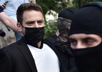 ATHENS, GREECE - JUNE 18: Babis Anagnostopoulos leaves the court escorted by police on June 18, 2021 in Athens, Greece. On June 17th Babis Anagnostopoulos, a 32-year-old pilot, confessed to having killed his British wife Caroline Crouch on May 11th, after Greek police disproved his initial claim that she had been killed during a robbery. (Photo by Milos Bicanski/Getty Images)