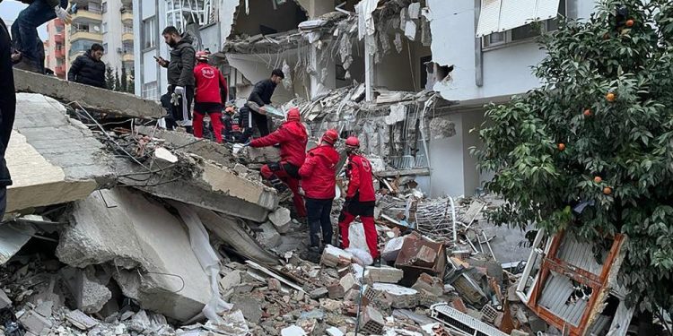 KAHRAMANMARAS, TURKIYE - FEBRUARY 06: A view of debris as rescue workers conduct search and rescue operations after the 7.4 magnitude earthquake hits Kahramanmaras, Turkiye on February 06, 2023. (Photo by Eren Bozkurt/Anadolu Agency via Getty Images)

Rescue workers search through debris in Kahramanmaras, Turkey on Monday. (Eren Bozkurt/Anadolu Agency/Getty Images)