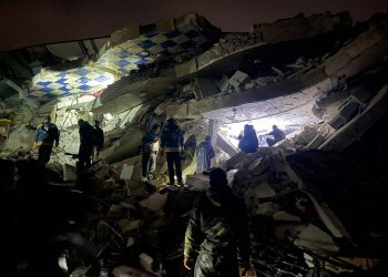 Syrian rescuers (White Helmets) and civilians search for victims and survivors amid the rubble of a collapsed building following an earthquake, in the rebel-held northern countryside of Syria's Idlib province on the border with Turkey, early on February 6, 2023, - At least 50 have been reportedly killed in north Syria after a 7.8-magnitude earthquake that originated in Turkey and was felt across neighbouring countries. (Photo by Aaref WATAD / AFP) (Photo by AAREF WATAD/AFP via Getty Images)

Rescue workers search the rubble of a collapsed building in Idlib, Syria, on February 6. (Aaron Watad/AFP/Getty Images)