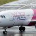 FILE PHOTO: A Wizz Air Airbus A320 at Luton Airport, Luton, Britain, May 1, 2020. REUTERS/Andrew Boyers/File Photo