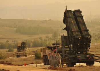 U.S. Service members stand by a Patriot missile battery in Gaziantep, Turkey, Feb. 4, 2013, during a visit from U.S. Deputy Secretary of Defense Ashton B. Carter, not shown. U.S. and NATO Patriot missile batteries and personnel deployed to Turkey in support of NATO?s commitment to defending Turkey?s security during a period of regional instability. (DoD photo by Glenn Fawcett/Released)