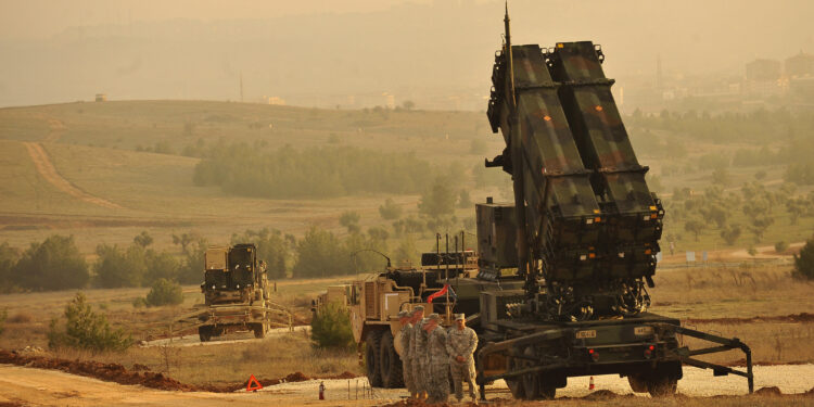 U.S. Service members stand by a Patriot missile battery in Gaziantep, Turkey, Feb. 4, 2013, during a visit from U.S. Deputy Secretary of Defense Ashton B. Carter, not shown. U.S. and NATO Patriot missile batteries and personnel deployed to Turkey in support of NATO?s commitment to defending Turkey?s security during a period of regional instability. (DoD photo by Glenn Fawcett/Released)