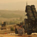 U.S. Service members stand by a Patriot missile battery in Gaziantep, Turkey, Feb. 4, 2013, during a visit from U.S. Deputy Secretary of Defense Ashton B. Carter, not shown. U.S. and NATO Patriot missile batteries and personnel deployed to Turkey in support of NATO?s commitment to defending Turkey?s security during a period of regional instability. (DoD photo by Glenn Fawcett/Released)
